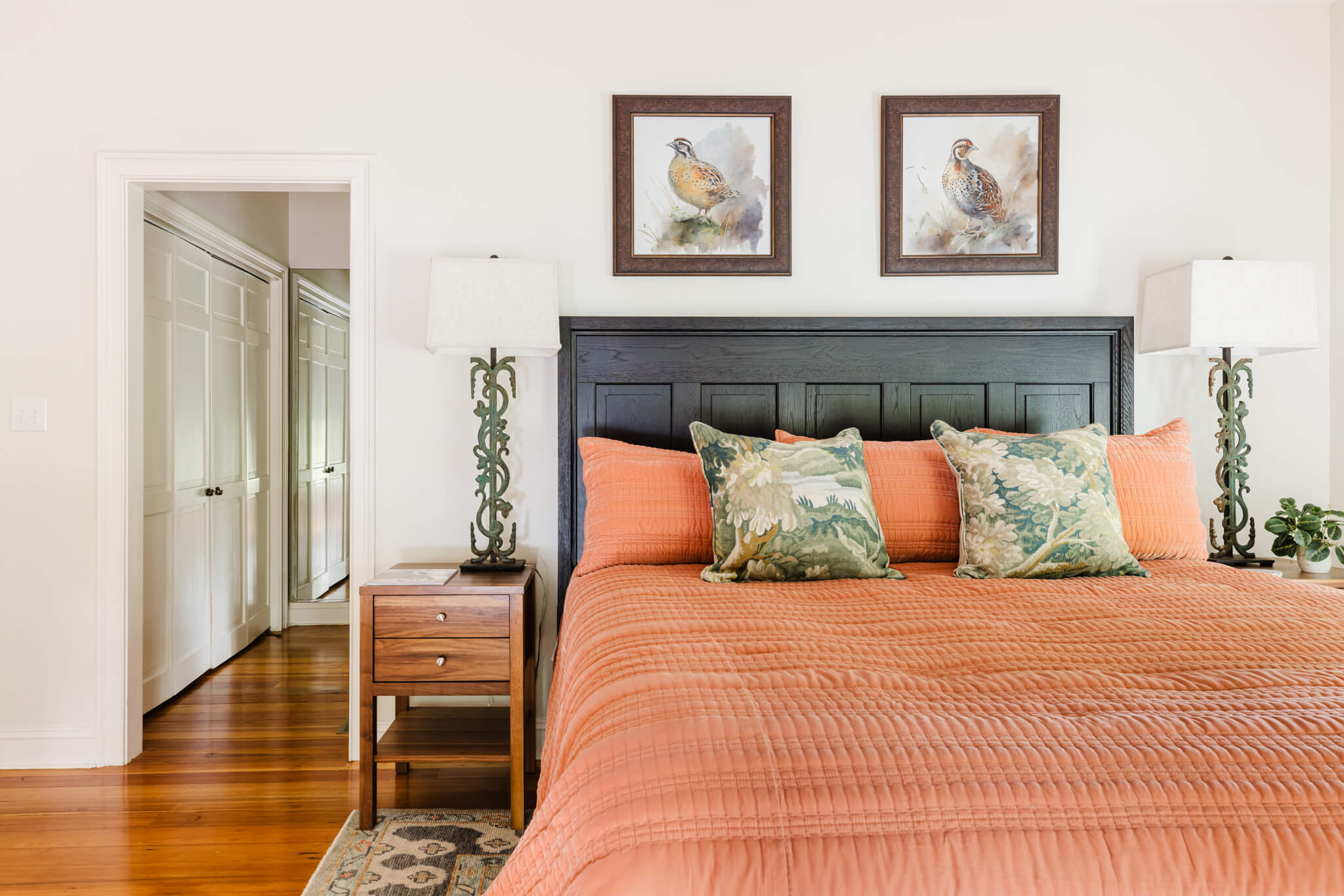 4 king sized bed orange bedspread sporting art